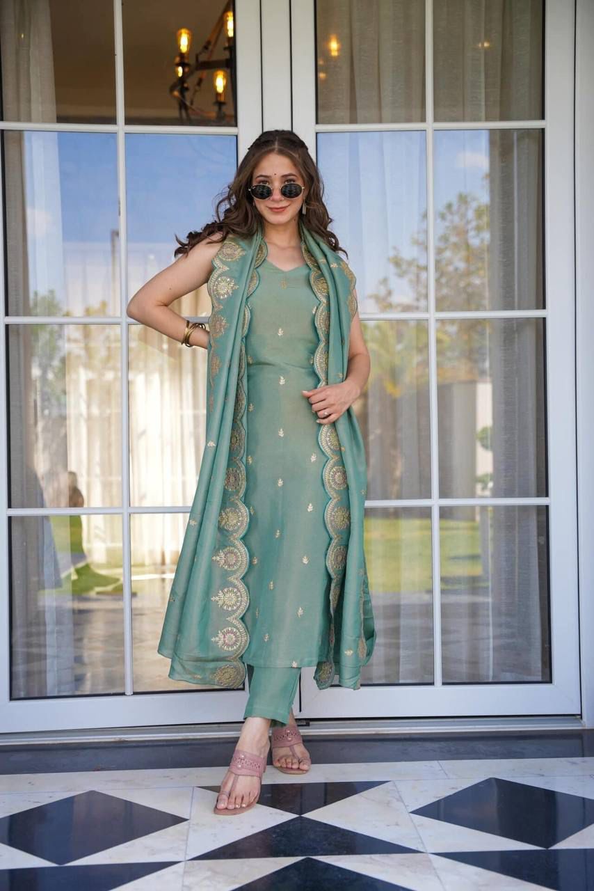 Introducing our exquisite straight olive green heavy embroidered suit