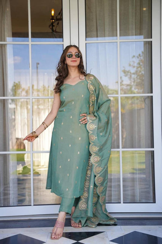 Introducing our exquisite straight olive green heavy embroidered suit