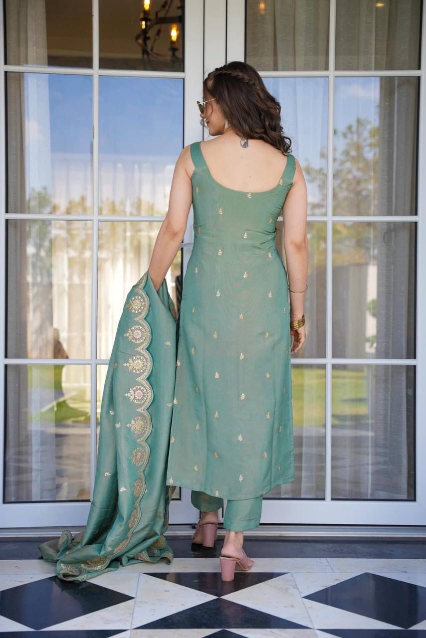 Introducing our exquisite straight olive green heavy embroidered suit