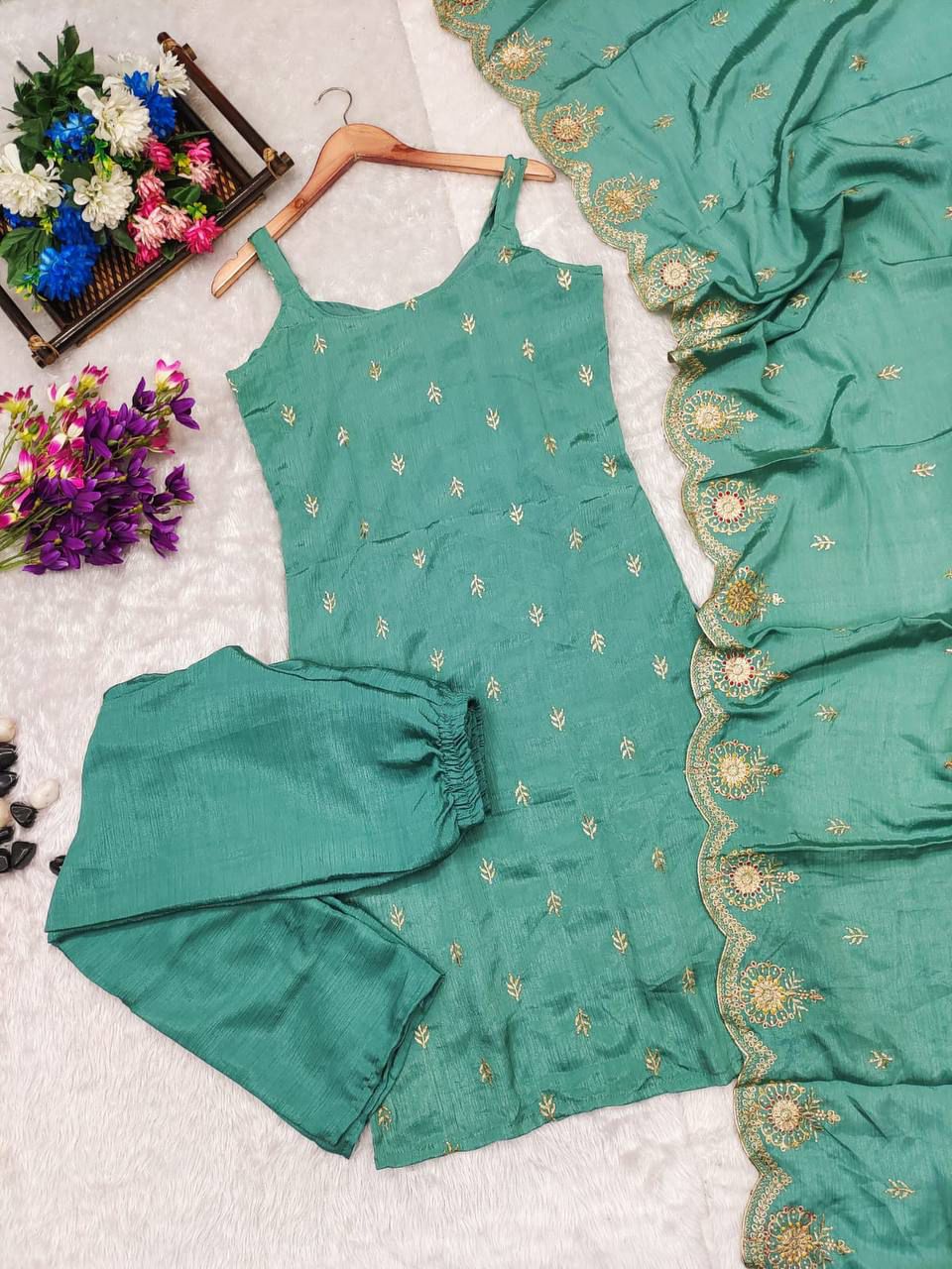 Introducing our exquisite straight olive green heavy embroidered suit