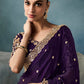 Drape yourself in this majestic royal purple silk saree