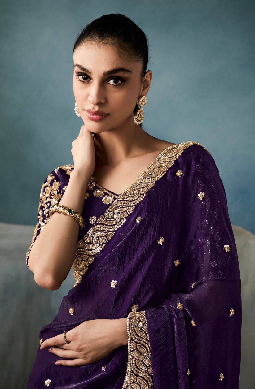 Drape yourself in this majestic royal purple silk saree