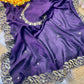 Drape yourself in this majestic royal purple silk saree