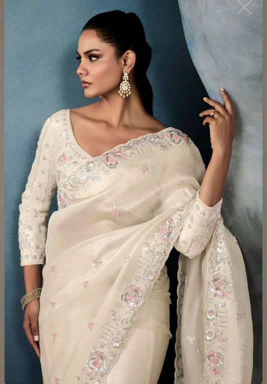 Adorned with delicate thread & sequin work Saree