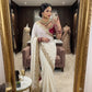 Elegant off-white rangoli silk fabric saree