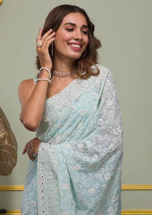 Faux geogert saree with white thread & seqnce saree