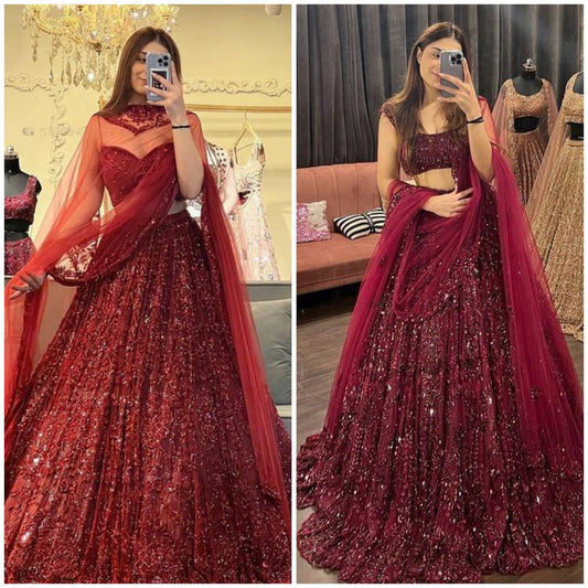 Launching Red opulent lehenga features meticulous sequin embroidery