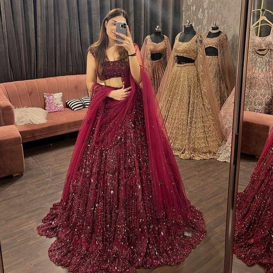 Launching Red opulent lehenga features meticulous sequin embroidery