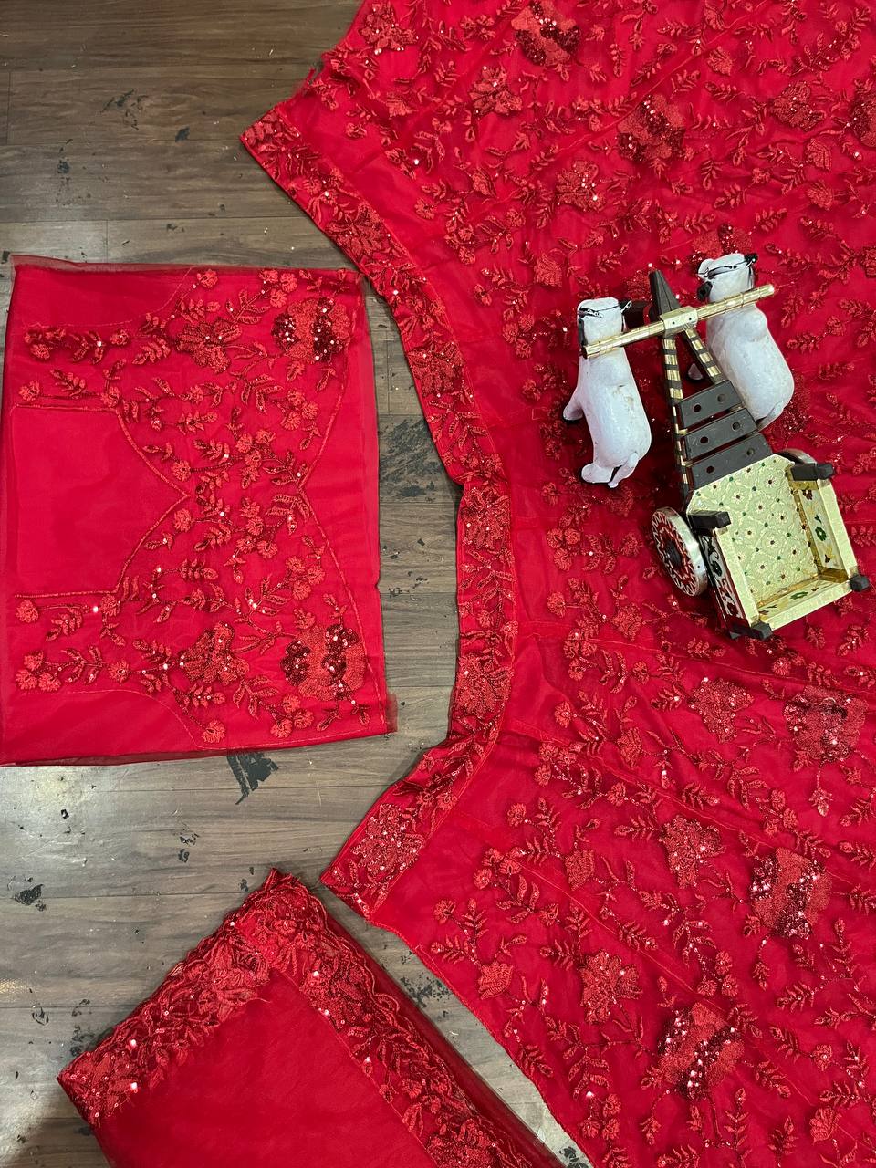 Launching Red opulent lehenga features meticulous sequin embroidery