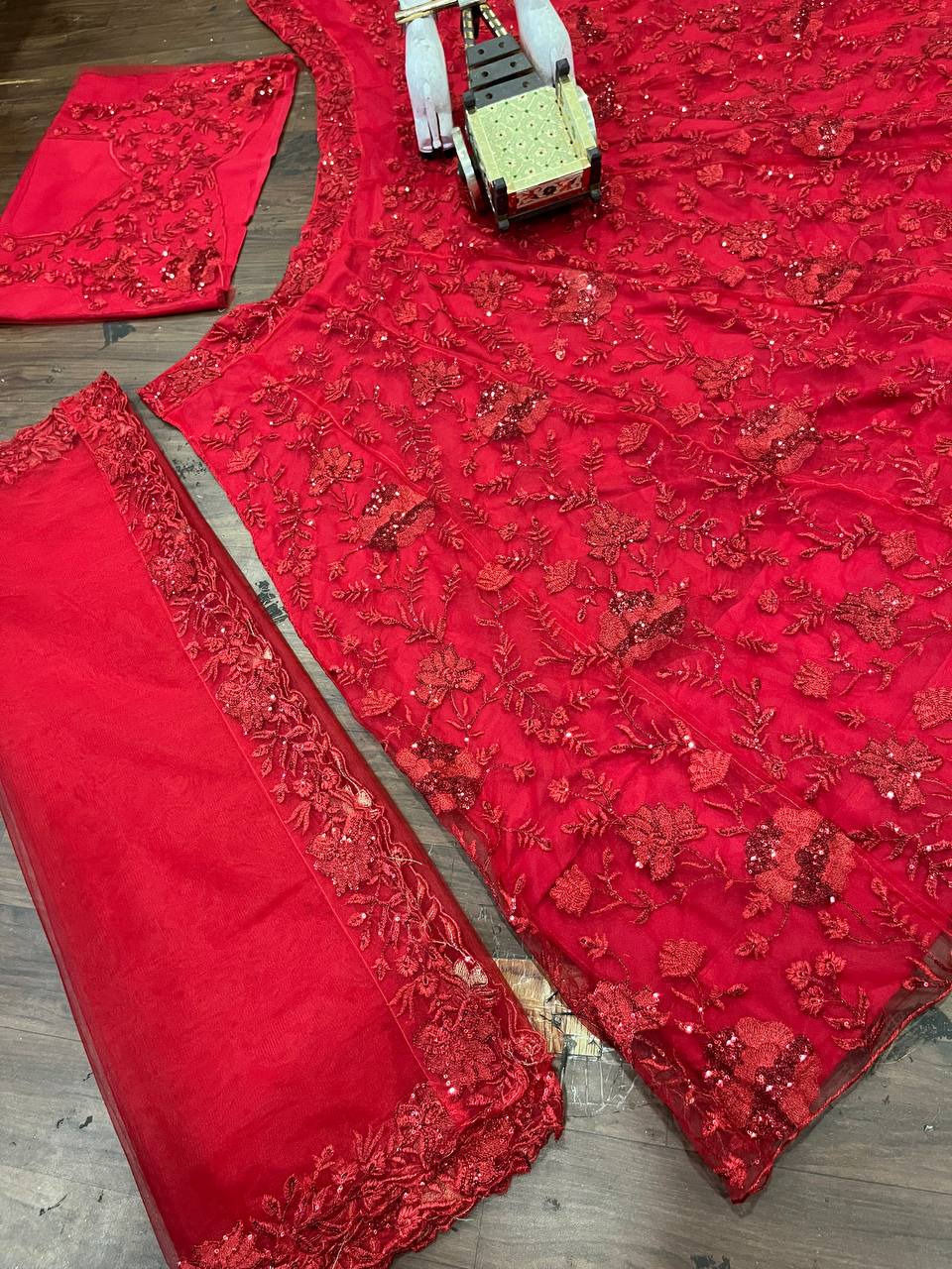 Launching Red opulent lehenga features meticulous sequin embroidery