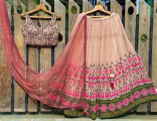 Chiku Pink colour Colour Embroidered Attractive Party Wear Silk Lehenga choli