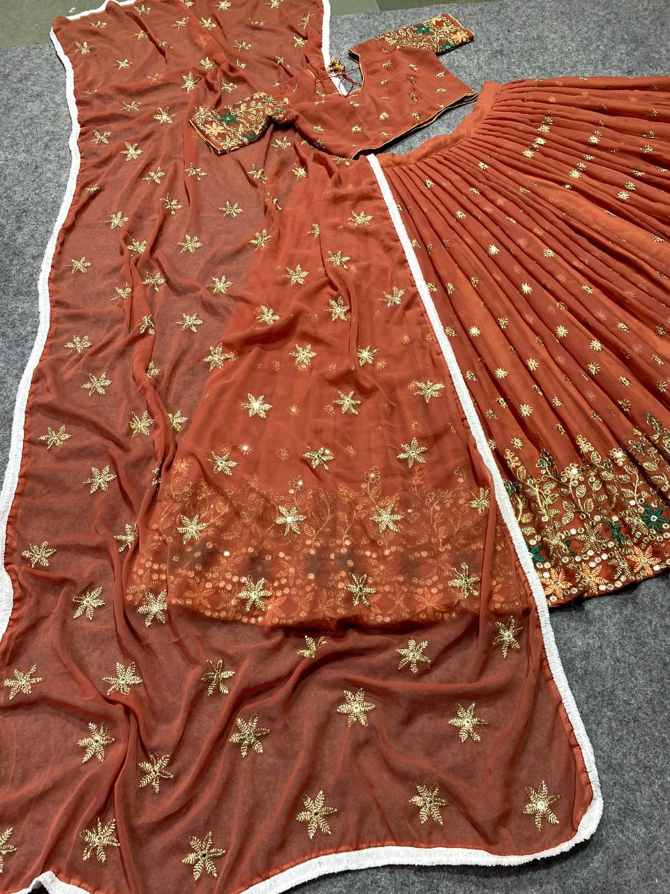 RUST COLORED DESIGNER EMBROIDERED SEQUINS WORK LEHENGA CHOLI