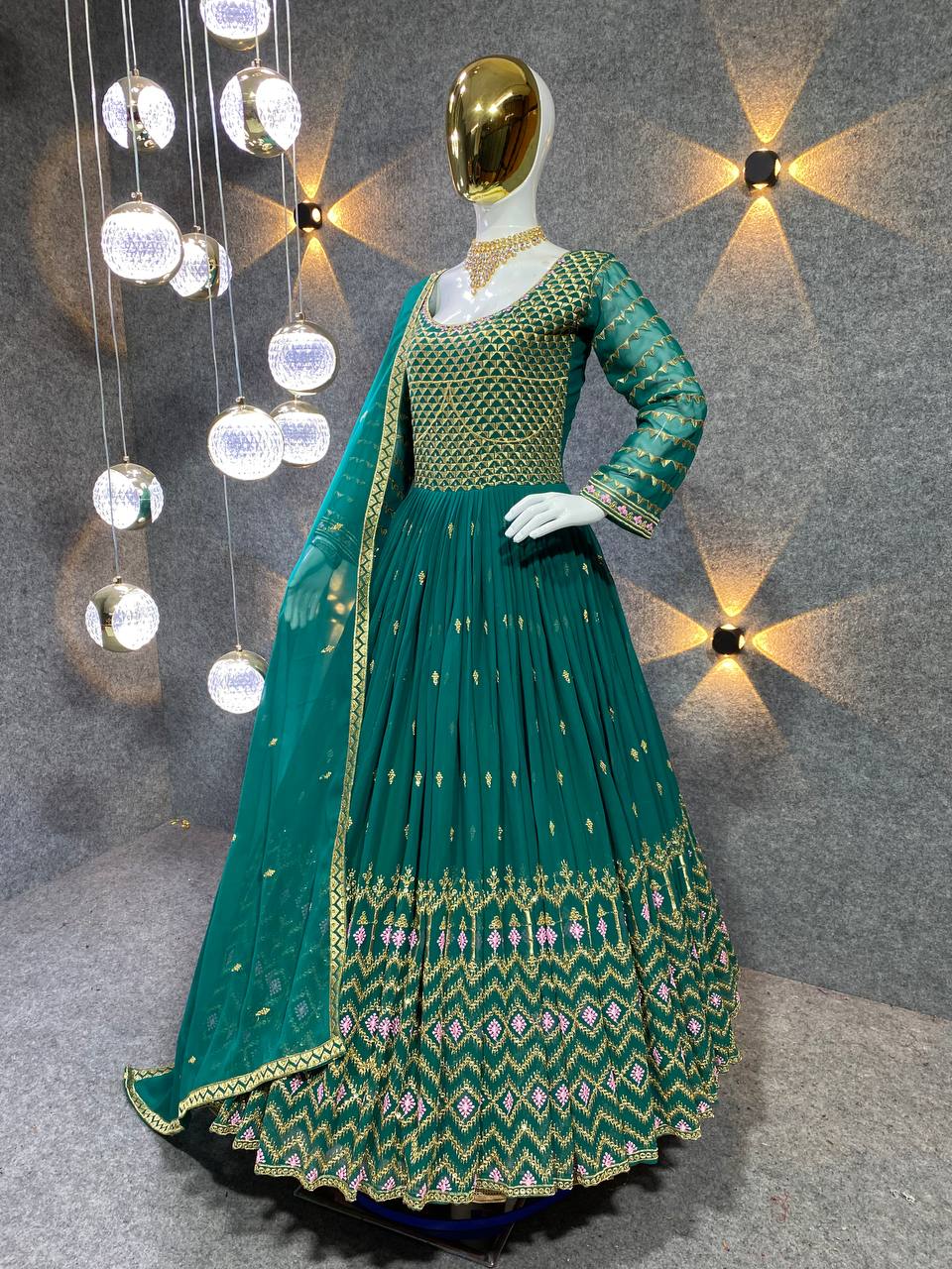 GREEN COLOUR HEAVY GEOGETTE FABRIC GOWN