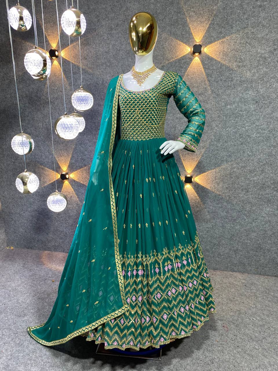 GREEN COLOUR HEAVY GEOGETTE FABRIC GOWN