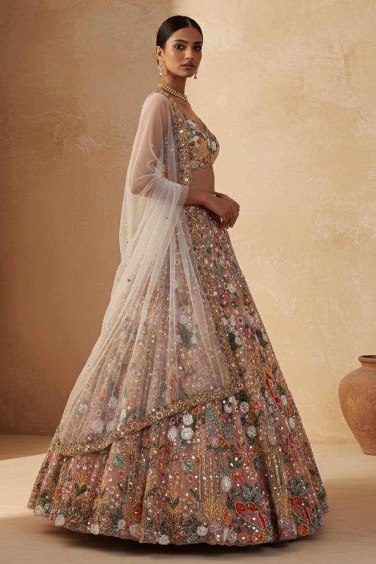Net lehenga with rainbow sequins Dori & thread work choli