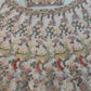 Net lehenga with rainbow sequins Dori & thread work choli