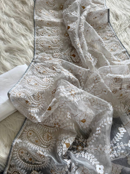 Organza Silk and the making being chikankari saree