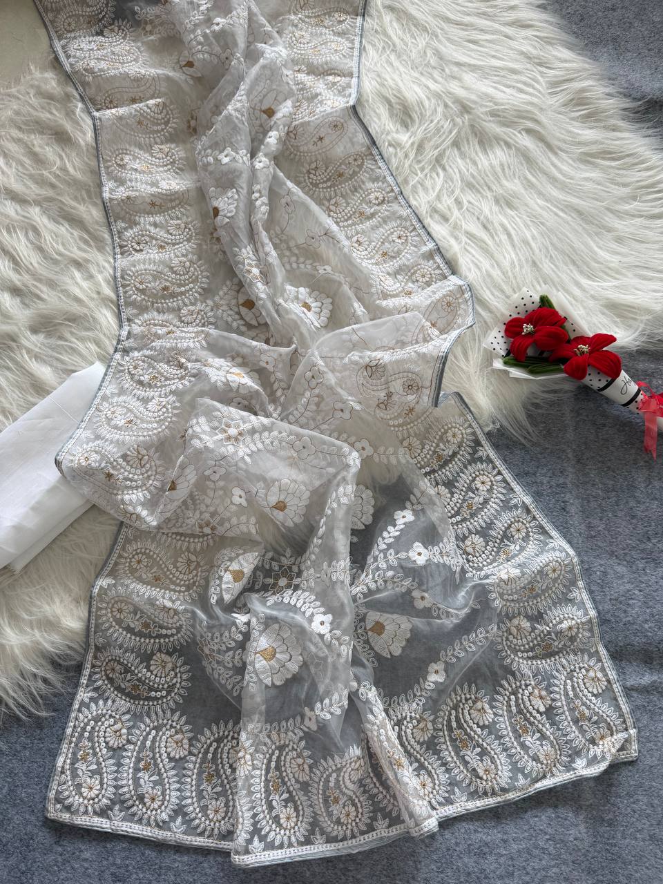 Organza Silk and the making being chikankari saree