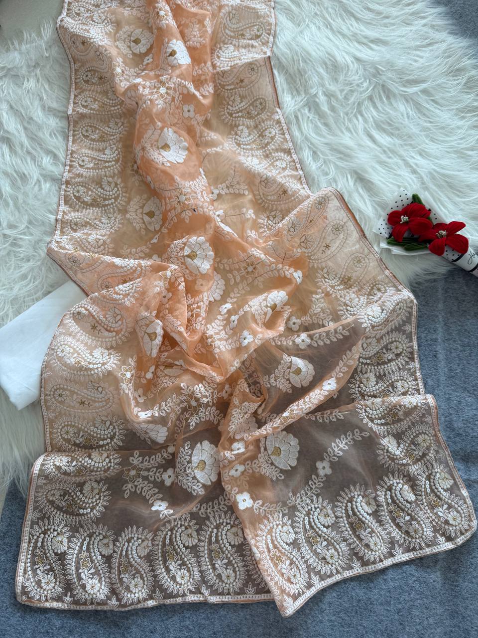 Organza Silk and the making being chikankari saree
