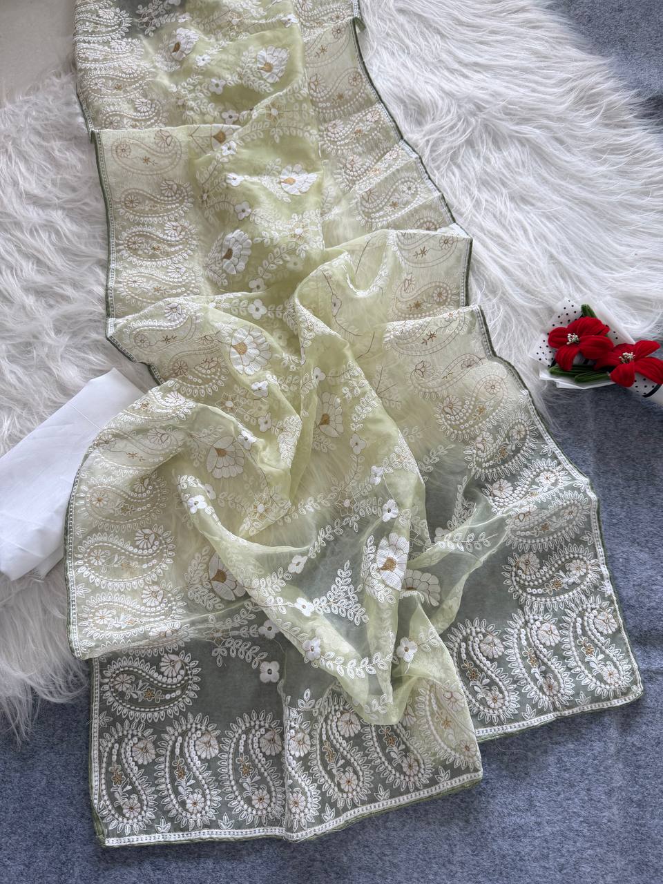 Organza Silk and the making being chikankari saree