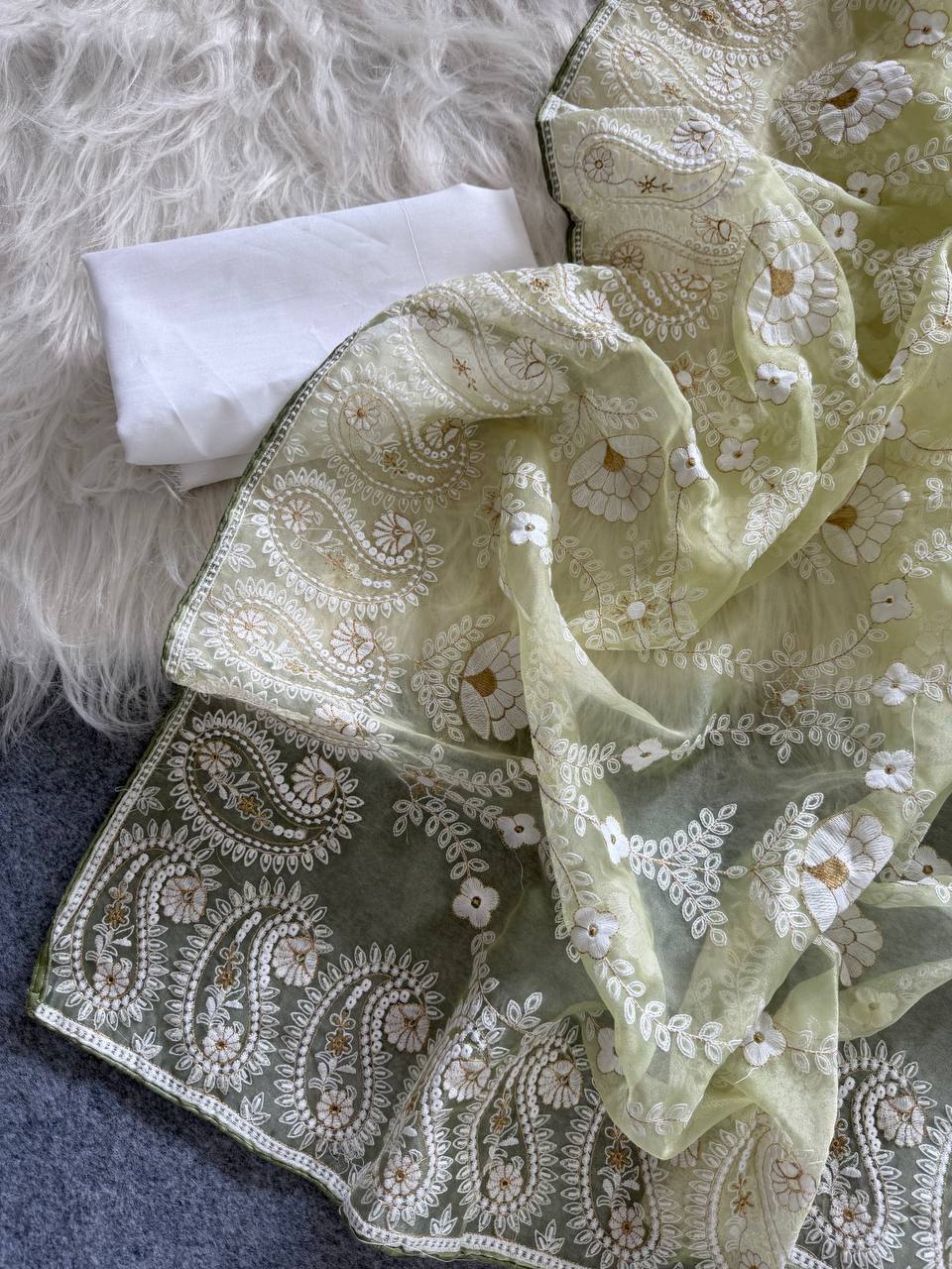 Organza Silk and the making being chikankari saree