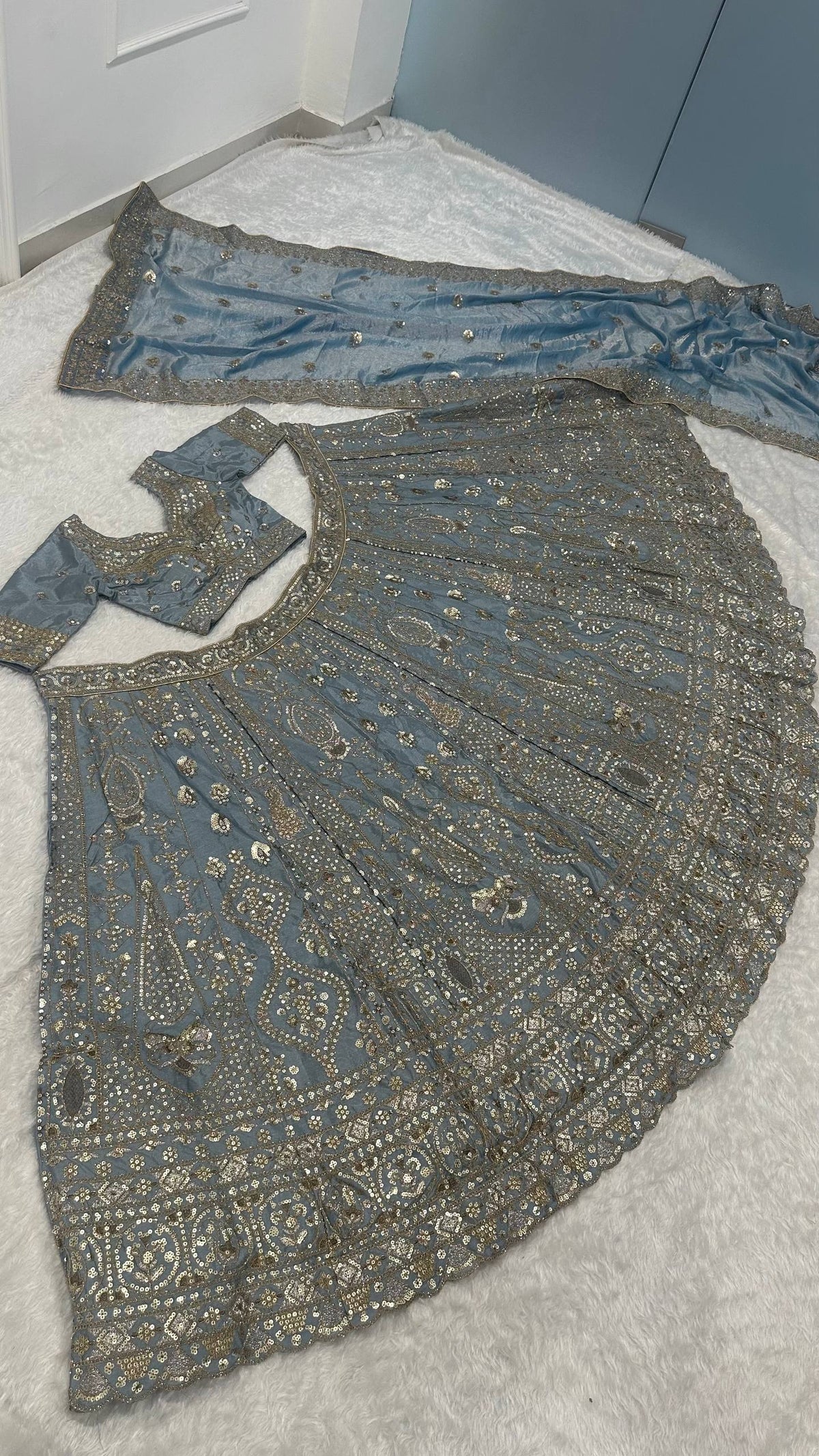 Crape silk lehenga with sequins dori & zari work choli