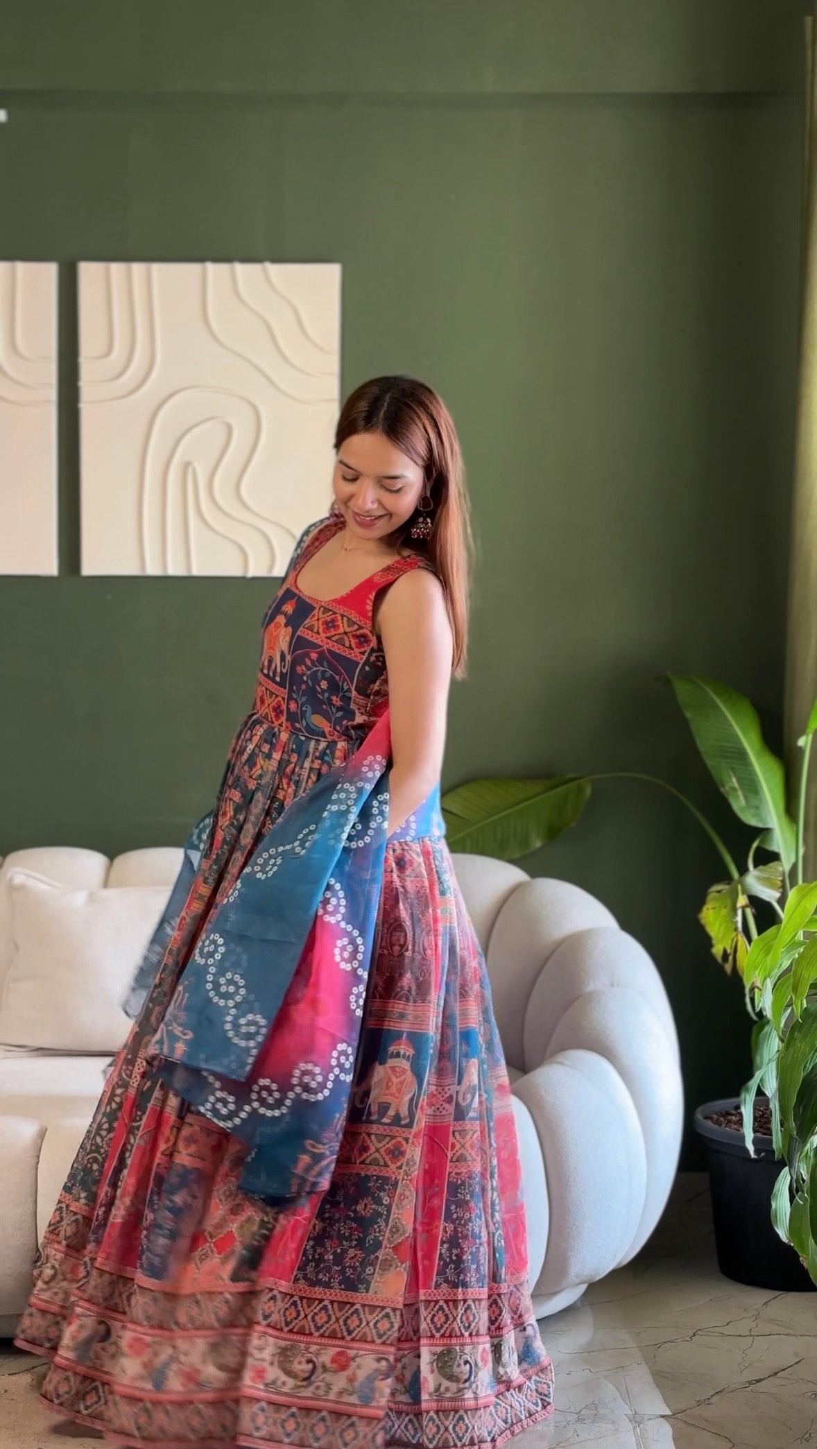 Elegant Patola printed festive gown with graceful flair