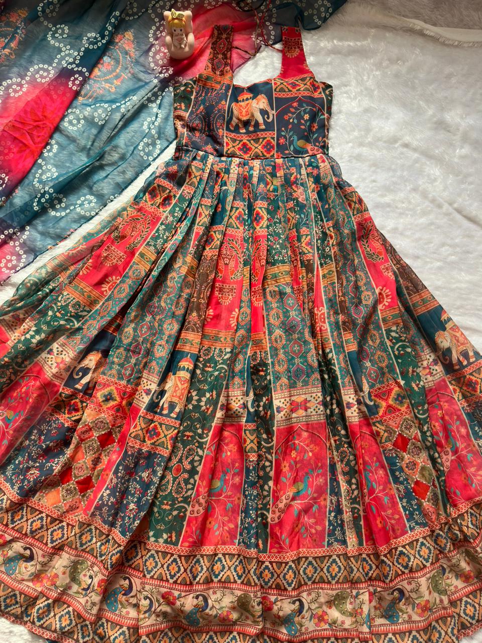 Elegant Patola printed festive gown with graceful flair