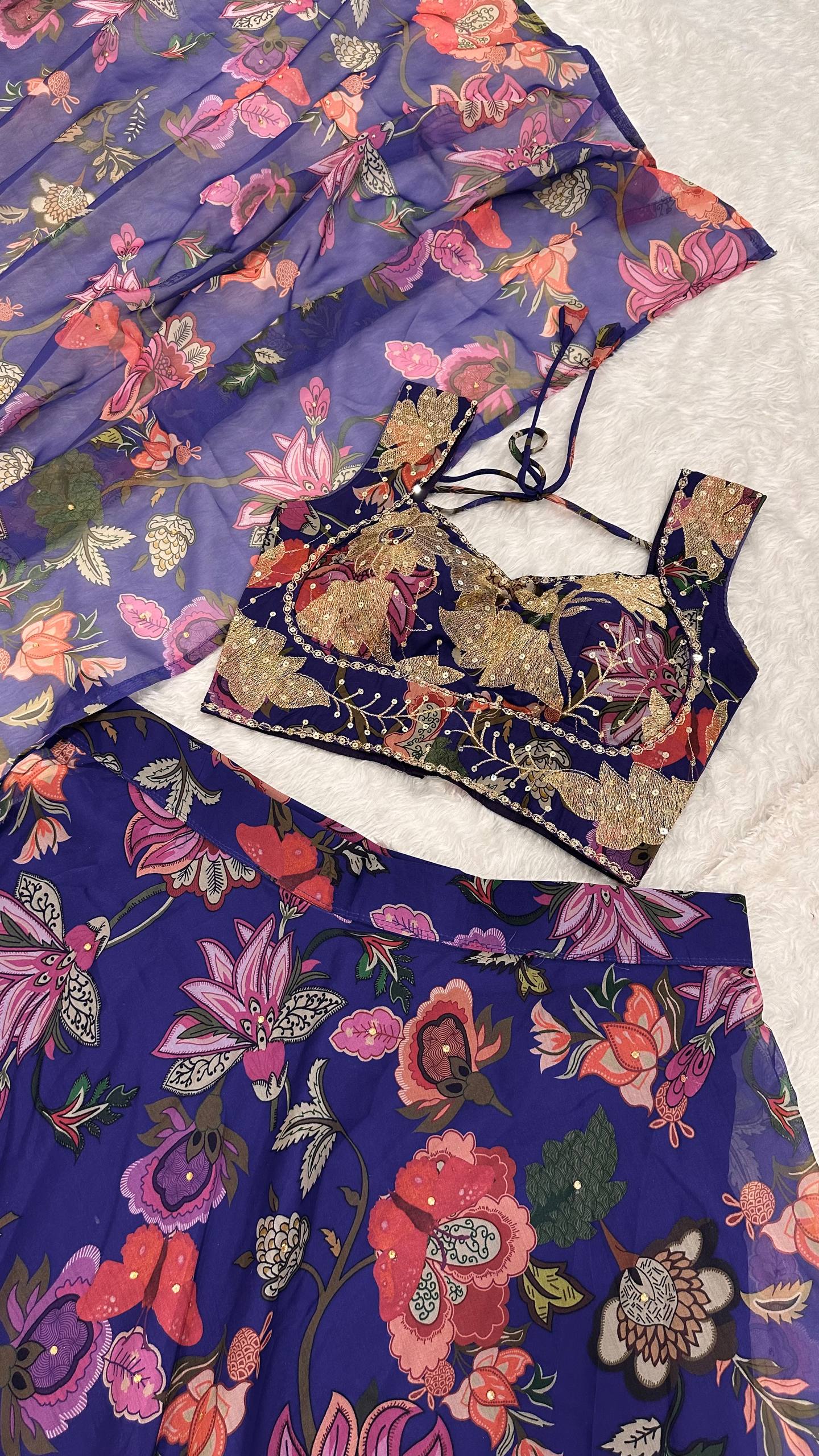 Tabby silk lehenga with floral print & stone work