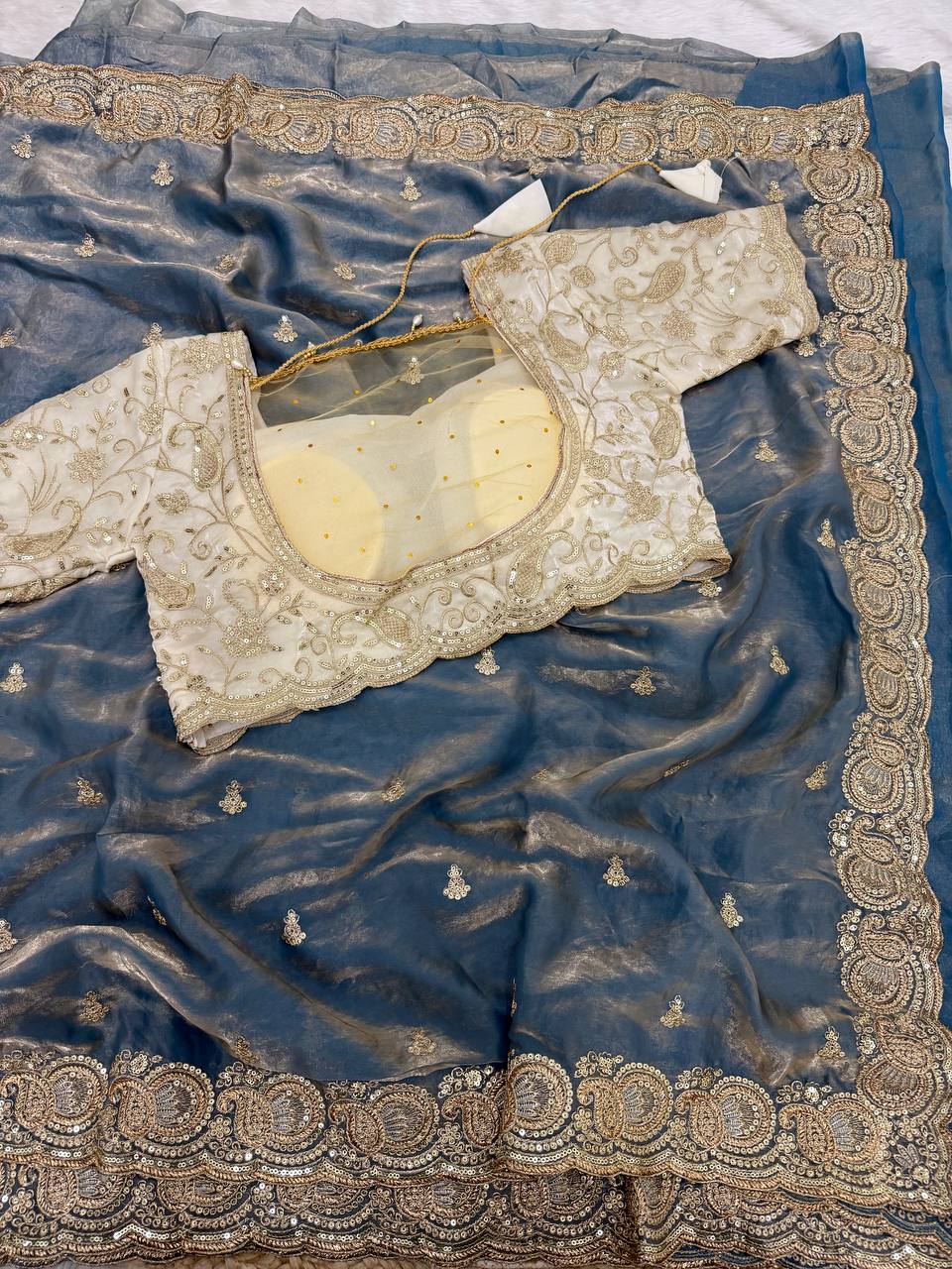Soft space silk Satin Saree with heavy embroidery choli