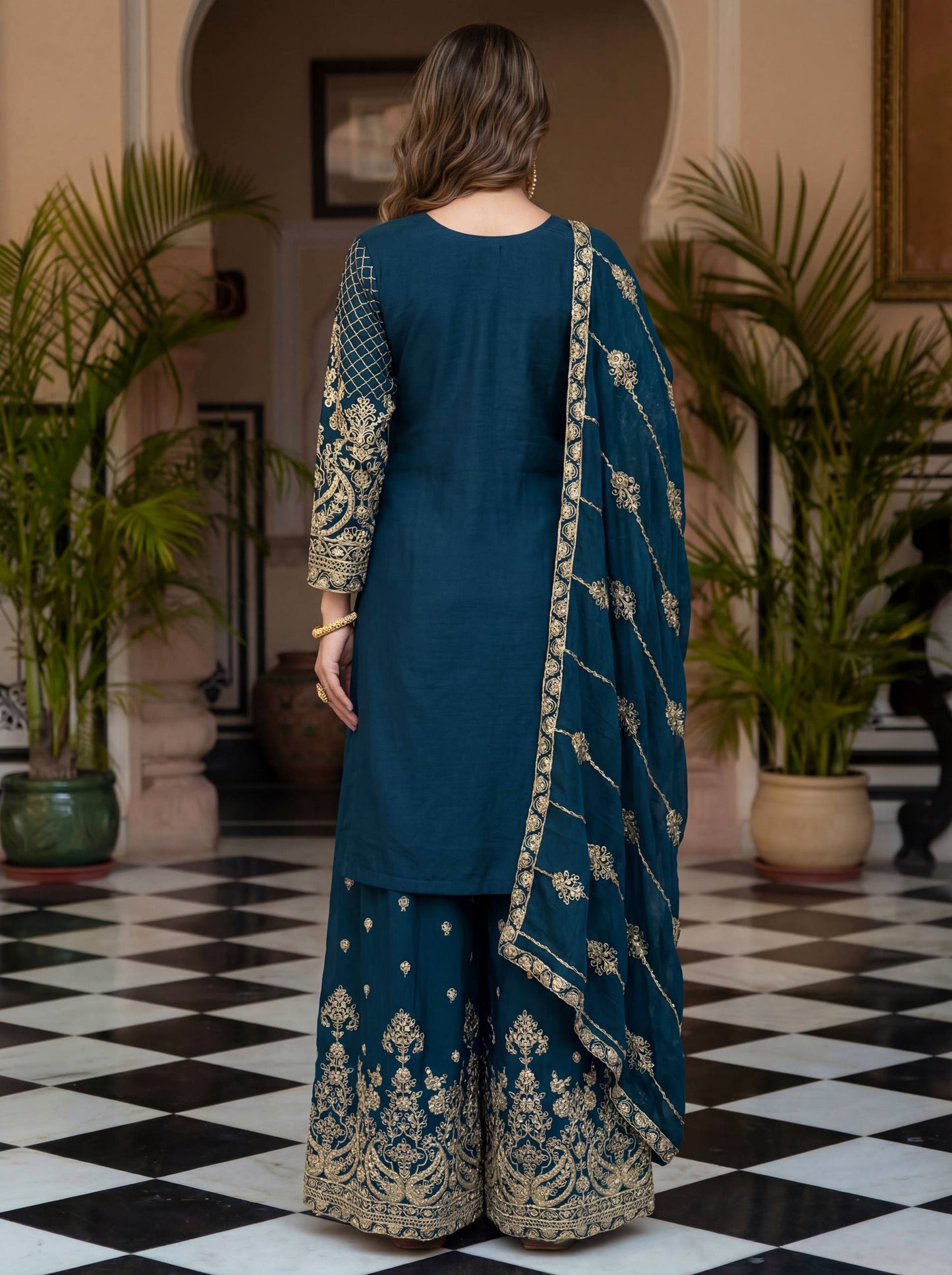 Elevate your festive style with these stunning embroidered sharara suits