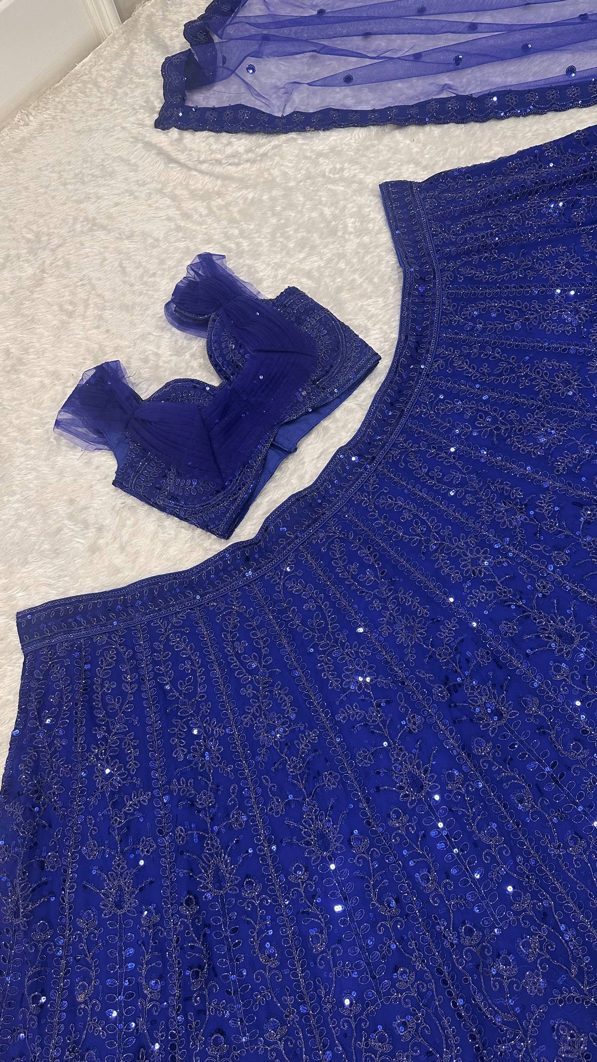 Faux Georgette lehenga with sequins & dori work choli
