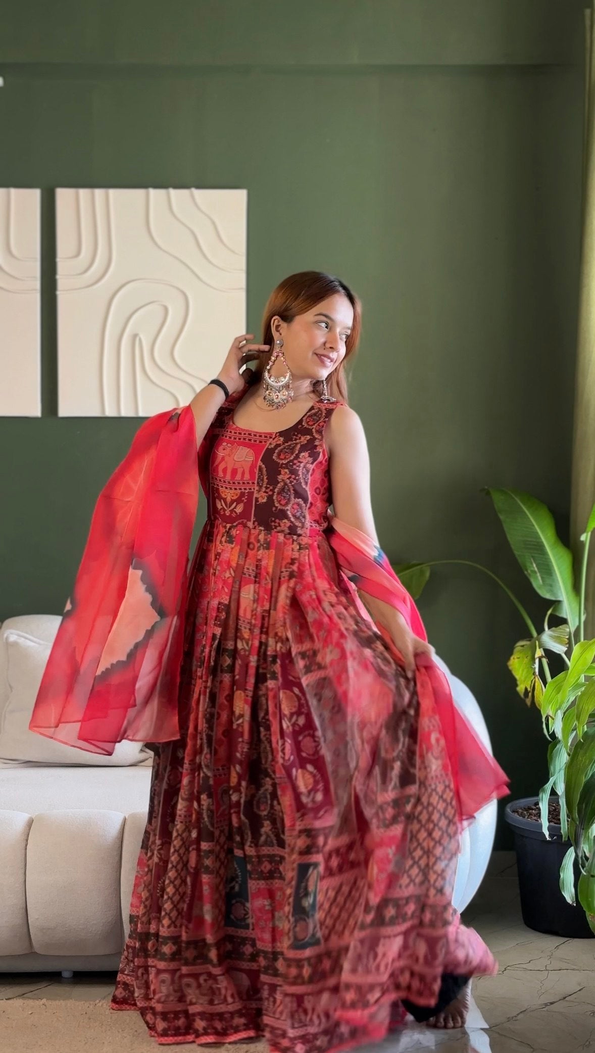 Elegant Patola printed festive gown with graceful flair