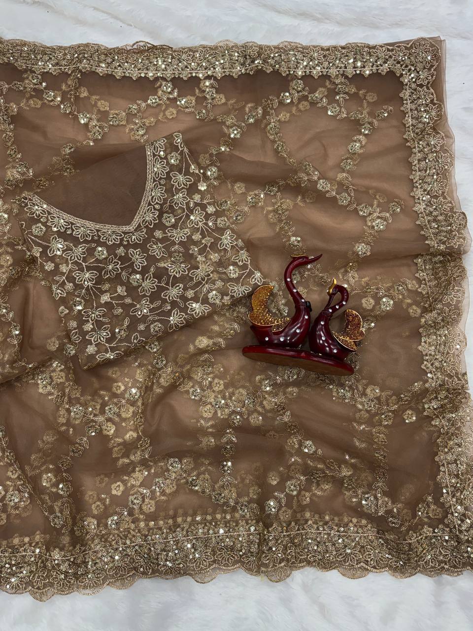 Soft net Beautiful sequins and Zari Embroidery Work saree