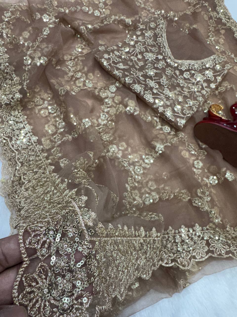 Soft net Beautiful sequins and Zari Embroidery Work saree