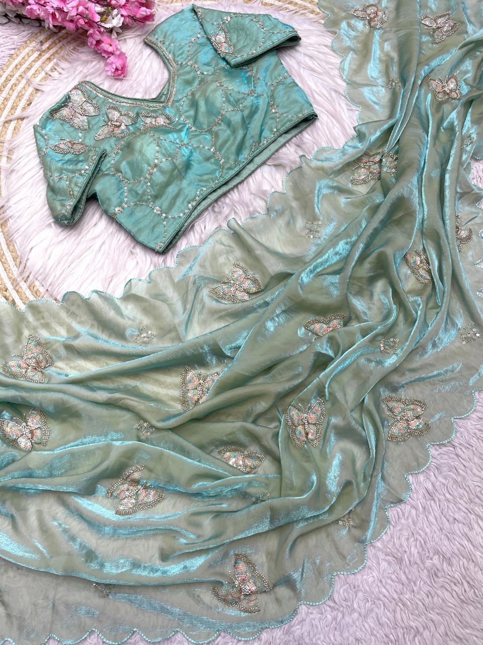 Beautiful khatli Brits work along with all over arco bodar saree